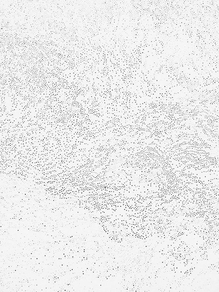 Tiny Holes on White Paper